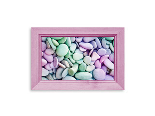 Photo frame with colorful sea stones picture isolated on white background