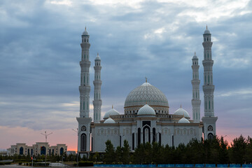 Fototapeta na wymiar Cloudy sky over Hazret Sultan Mosque in the early morning time. Nur-Sultan, Kazakhstan.