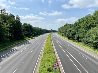 Fototapeta premium Closed highway A1 between Leverkusen and Burscheid in sunshine during the disaster alarm in North Rhine-Westphalia
