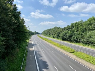 Closed highway A1 between Leverkusen and Burscheid in sunshine during the disaster alarm in North Rhine-Westphalia