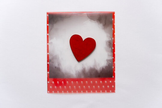 themed photo overlay with a hand-painted wooden heart on a light background with plenty of space for copy or text