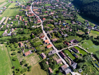 Aerial drone view, small typical hungarian village with the main street.
