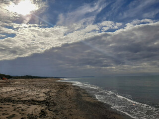 Seascape during a thunderstorm on the beach of Donoratico Tuscany Italy