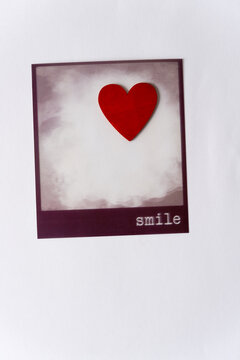 themed photo overlay with hand-painted wooden heart on a light background with plenty of space for copy or text
