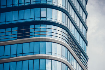 Fototapeta na wymiar close up. modern high-rise building made of concrete and glass.