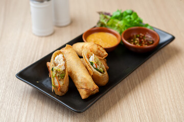 Traditional spring roll , Porpia  , a  fried crepe wrap with chinese sausage , tofu 