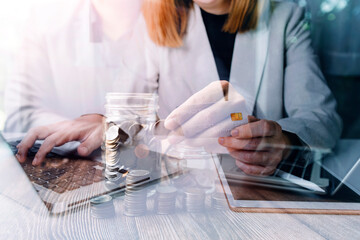 male hands holding a credit card and use mobile phone for Online payment online shopping