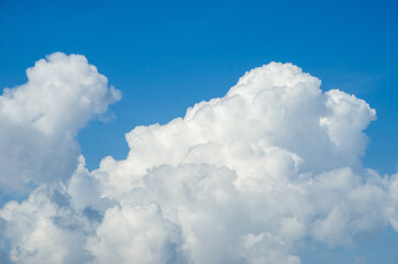 blue sky background with heavy clouds