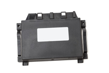 Plastic car engine control unit with metal elements on a white isolated background is the connecting center of various subsystems, units and assemblies. Monitoring the state of the moment. Spare part