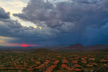 A high definition aerial view of a sunset during a monsoon in Arizona.
