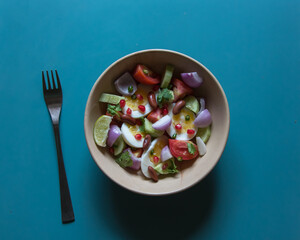 Popular food ingredient caesar salad in a bowl. Top view.