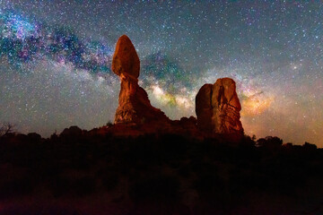 balanced rock starry night sky milky way