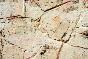 Texture of a concrete wall with cracks and scratches which can be used as a background