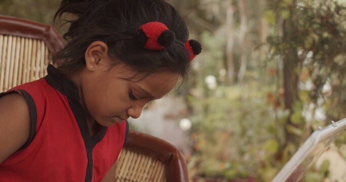 Closeup shot of an adorable South Asian female child
