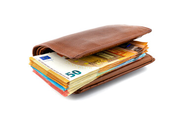 Brown leather mens wallet with a stack of Euro banknotes inside, isolated on a white background, 50 euros visible.