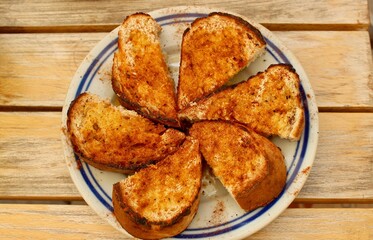 Roasted bread with oil, salt, paprika and spices. Dish in Bulgarian cuisine is called Gypsy banitsa