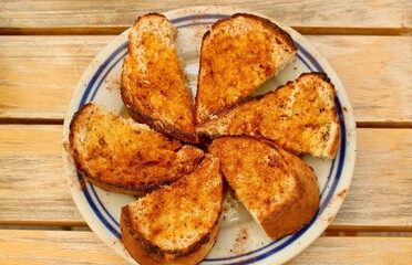 Roasted bread with oil, salt, paprika and spices. Dish in Bulgarian cuisine is called Gypsy banitsa