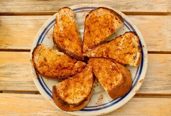 Roasted bread with oil, salt, paprika and spices. Dish in Bulgarian cuisine is called Gypsy banitsa