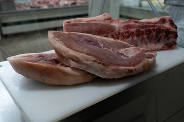 Cutting of Argentine pork meat in butchery