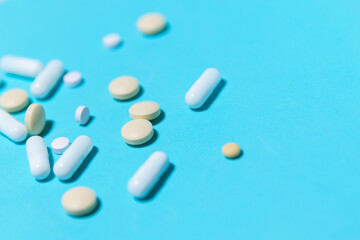 close up. various tablets on a blue background.