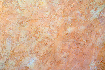 Texture of beige plaster. Rough wall of the building.