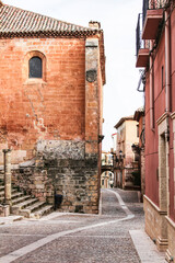 Fototapeta na wymiar Majestic and old stone houses through the streets of Alcaraz, Castile-la Mancha community, Spain