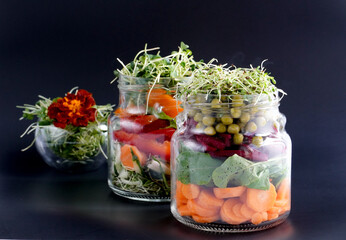 A snack of raw vegetables in a glass. Vegetarian snack options on the go