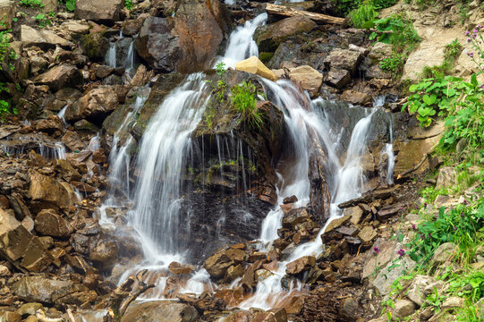 Cascade Trufanets Falls in Carpathian mountains- the highest natural waterfall in Transcarpathia at summer. Ukraine.