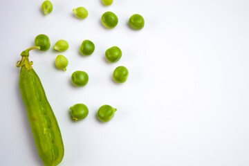 Green peas on a white background, your dietary lifestyle.