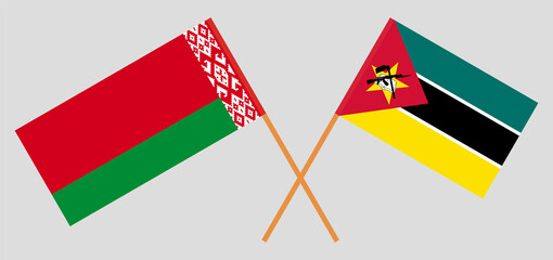 Crossed flags of Belarus and Mozambique. Official colors. Correct proportion
