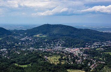 Fototapeta na wymiar View in summer over Baden-Baden under cloudy skies, Black Forest, Germany