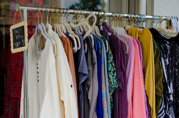 clothes in a shop, clothes hanger, vintage shop, thrift store