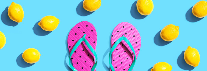 Summer concept with flip flops and lemons
