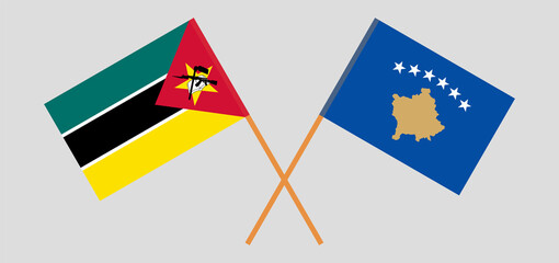 Crossed flags of Mozambique and Kosovo. Official colors. Correct proportion