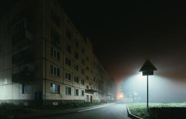 old residential apartment buildings in a foggy night.