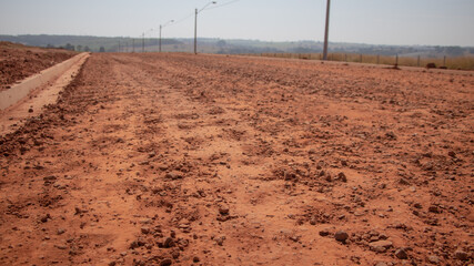 dirt road before receiving the asphalt layer