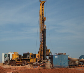 ground drilling machine in a mid of field
