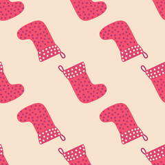 Christmas seamless pattern with red Christmas socks with snowflakes, specks