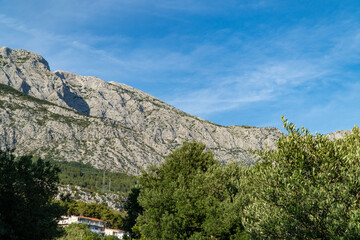 a mountain under a beautiful blue sky on the Adriatic