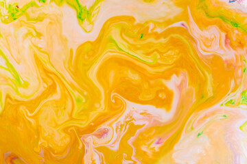 Fluid Art. Abstract blurred colorful background. Indian pattern vivid colors of yellow acid, orange and green