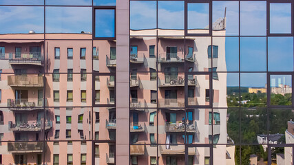 Riga in June: reflection in the business centre of the living building 