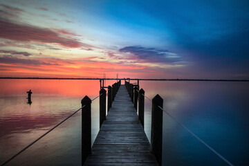Fototapeta premium Two Toned Sunrise Sky over Salt Water