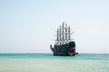Fototapeta na wymiar Large white pirate-style sailing ship
