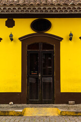 Historic Center of Cananéia, São Paulo, Brazil. Yellow house facade with colonial architecture