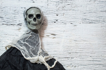 skull of ghost in happy halloween party on white wall background