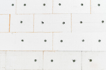 External wall insulating with styrofoam boards. Seamless pattern.