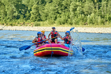 rafting on a large boat on a mountain river