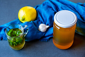 healthy honey with herbs, ginger, garlic, and lemon