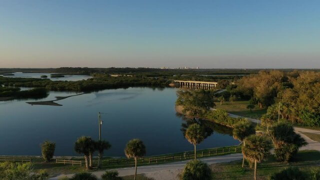 Aerial of US 1 bridge over Florida's Spruce Creek Basin watershed including Doris Leeper Park, the Spruce Creek and Strickland Bay, dotted with red mangrove (Rhizophora mangle) islands.