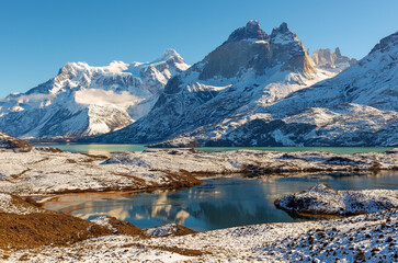 Nordenskjold lake and Cuernos del Paine peaks at sunset in winter, Torres del Paine national park, Patagonia, Chile.